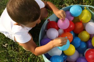 color powder water balloon fight